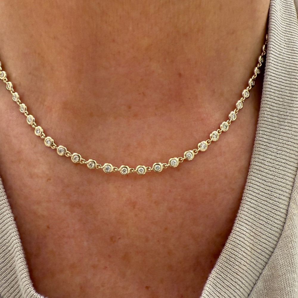 Diamonds by the inch, 1.7ct of natural diamonds bezel set in 14k